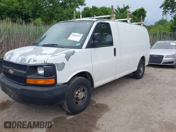 2011 Chevrolet Express Cargo with VIN 1GCWGFCA4B1172655, listed as a IAAI auction lot 42451763 with 326,327 mi miles and . Bid and sale history available at DreamBid. Image 2.
