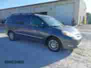 2009 Toyota Sienna XLE z VIN 5TDZK22C19S272510, wystawiony jako IAAI lot #43378731 z przebiegiem 180 183 mil mil oraz . Historia ofert i sprzedaży dostępna na DreamBid. Obrazek 1.