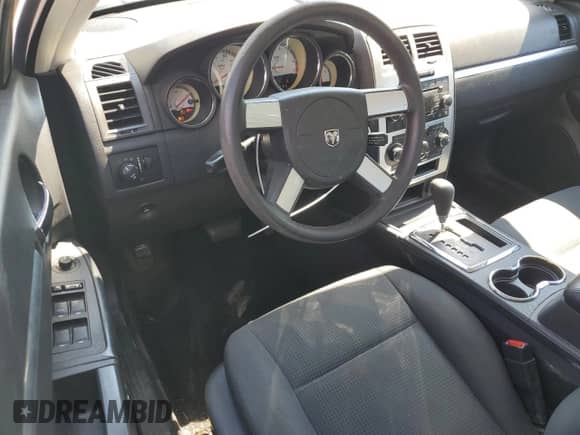 2010 Dodge Charger SXT с VIN 2B3CA3CV8AH237529, выставлен на аукционе Copart как лот 69405074 с пробегом 241 942 миль миль и Списание • Salvage title. История ставок и продаж доступна на DreamBid. Изображение 8.