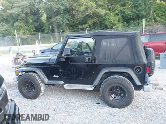 2001 Jeep Wrangler SE with VIN 1J4FA29P01P350847, listed as a IAAI auction lot 42821806 with 205,522 mi miles and . Bid and sale history available at DreamBid. Image 14.