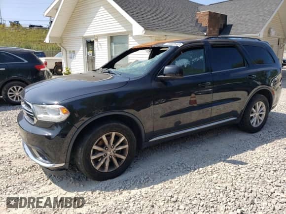 2014 Dodge Durango SXT with VIN 1C4RDJAG2EC314641, listed as a Copart auction lot 72002515 with Not provided miles and Salvage title. Bid and sale history available at DreamBid. Image 1.