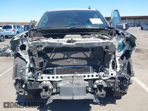 2022 Chevrolet Silverado 1500 RST with VIN 3GCUDEET4NG595797, listed as a IAAI auction lot 42921820 with 66,506 mi miles and . Bid and sale history available at DreamBid. Image 6.