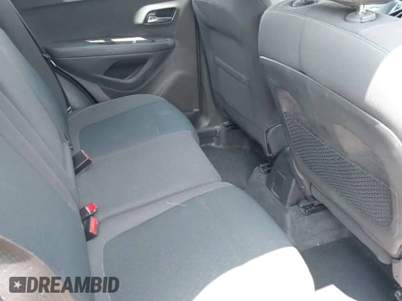 2015 Chevrolet Trax LS z VIN KL7CJKSB6FB247070, wystawiony jako IAAI lot #42735383 z przebiegiem 141 791 mil mil oraz . Historia ofert i sprzedaży dostępna na DreamBid. Obrazek 8.