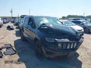 2020 Jeep Grand Cherokee Laredo E with VIN 1C4RJEAG3LC246010, listed as a IAAI auction lot 43193999 with 95,260 mi miles and . Bid and sale history available at DreamBid. Image 1.