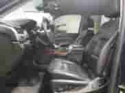 2018 Chevrolet Tahoe Premier with VIN 1GNSKCKC1JR186910, listed as a Copart auction lot 68302015 with 99,990 mi miles and Salvage title. Bid and sale history available at DreamBid. Image 7.