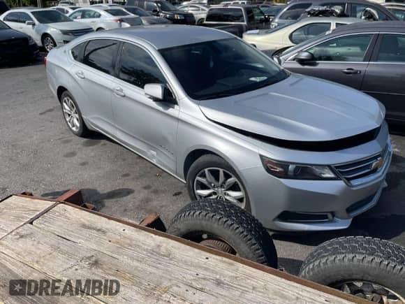 2016 Chevrolet Impala LT with VIN 2G1115S31G9164484, listed as a IAAI auction lot 41929823 with 246,565 mi miles and . Bid and sale history available at DreamBid. Image 1.