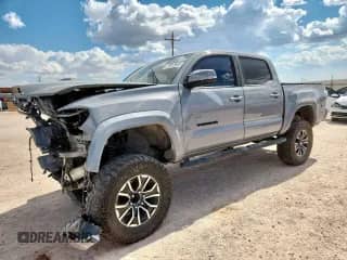 2020 Toyota Tacoma SR5 with VIN 5TFCZ5AN8LX222808, listed as a Copart auction lot 70812695 with 97,872 mi miles and Salvage title. Bid and sale history available at DreamBid. Image 1.