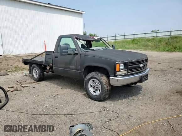 1996 Chevrolet Silverado 2500 с VIN 1GCGK24R5TE237782, выставлен на аукционе Copart как лот 62363975 с пробегом 193 992 миль миль и Чистый • Clean title. История ставок и продаж доступна на DreamBid. Изображение 14.