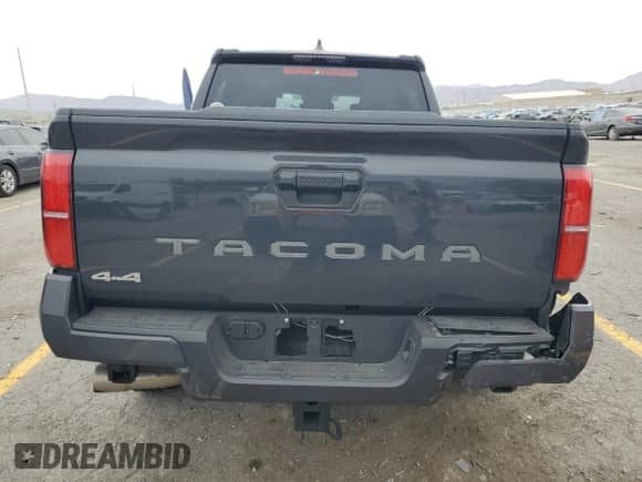 2024 Toyota Tacoma SR5 with VIN 3TMLB5JN0RM071045, listed as a Copart auction lot 70163855 with 8,616 mi miles and Salvage title. Bid and sale history available at DreamBid. Image 6.