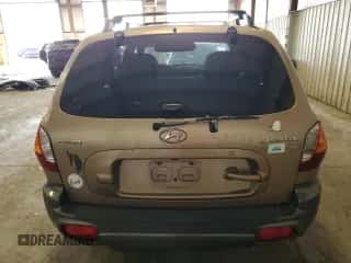 2004 Hyundai Santa Fe GLS с VIN KM8SC13D64U662051, выставлен на аукционе Copart как лот 78232394 с пробегом Не указан миль и Списание • Salvage title. История ставок и продаж доступна на DreamBid. Изображение 6.
