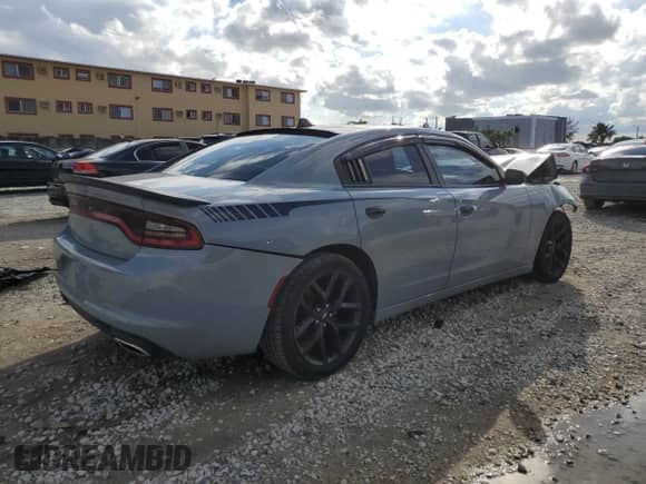 2021 Dodge Charger SXT с VIN 2C3CDXBG7MH579837, выставлен на аукционе Copart как лот 85642375 с пробегом 65 423 миль миль и На запчасти • Non repairable. История ставок и продаж доступна на DreamBid. Изображение 3.