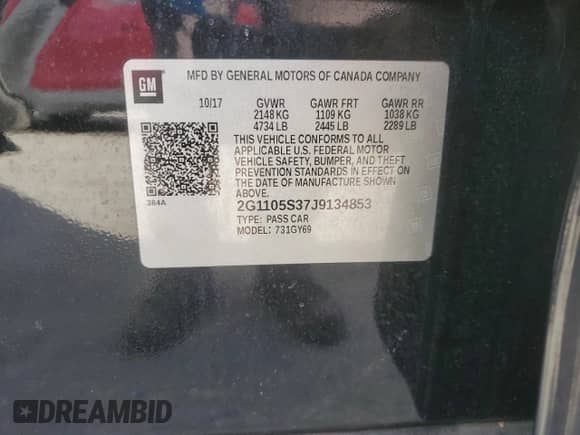 2018 Chevrolet Impala LT z VIN 2G1105S37J9134853, wystawiony jako Copart lot #90471975 z przebiegiem 163 337 mil mil oraz Szkoda całkowita • Salvage title. Historia ofert i sprzedaży dostępna na DreamBid. Obrazek 13.