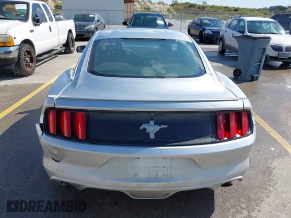 2015 Ford Mustang V6 with VIN 1FA6P8AM8F5301963, listed as a IAAI auction lot 43391100 with 179,630 mi miles and . Bid and sale history available at DreamBid. Image 16.