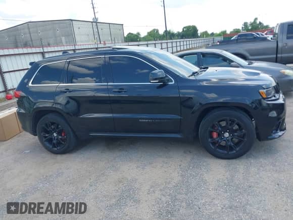 2014 Jeep Grand Cherokee SRT-8 с VIN 1C4RJFDJ4EC184701, выставлен на аукционе IAAI как лот 42924089 с пробегом 138 137 миль миль и . История ставок и продаж доступна на DreamBid. Изображение 13.