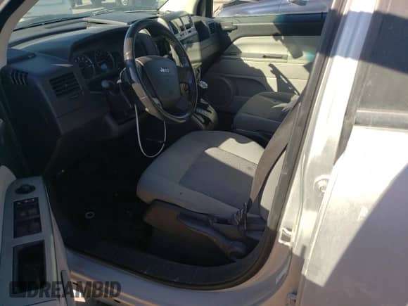 2007 Jeep Compass Sport with VIN 1J8FF47W47D136671, listed as a Copart auction lot 69504735 with Not provided miles and Salvage title. Bid and sale history available at DreamBid. Image 7.