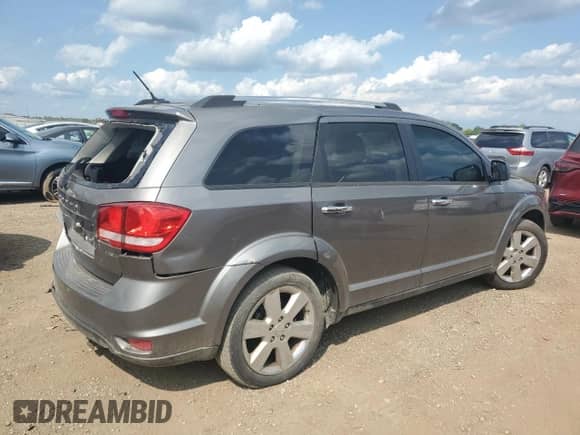 2012 Dodge Journey Crew with VIN 3C4PDCDG1CT204552, listed as a Copart auction lot 66494005 with 145,067 mi miles and Salvage title. Bid and sale history available at DreamBid. Image 3.