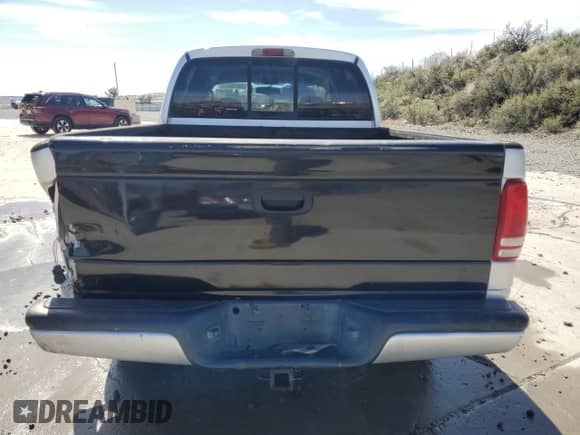 2003 Dodge Dakota Sport with VIN 1D7HG38N03S158272, listed as a Copart auction lot 52239655 with 259,687 mi miles and Salvage title. Bid and sale history available at DreamBid. Image 6.