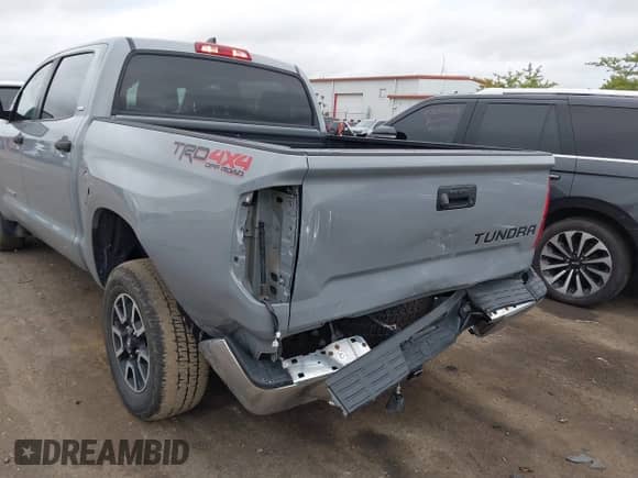 2021 Toyota Tundra SR5 with VIN 5TFDY5F18MX037950, listed as a IAAI auction lot 43029193 with 52,984 mi miles and . Bid and sale history available at DreamBid. Image 6.
