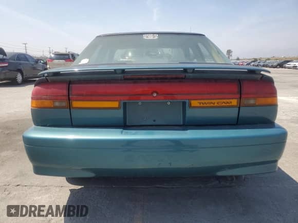 1994 Saturn SL с VIN 1G8ZK5571RZ301061, выставлен на аукционе Copart как лот 55270685 с пробегом 31 990 миль миль и Чистый • Clean title. История ставок и продаж доступна на DreamBid. Изображение 6.