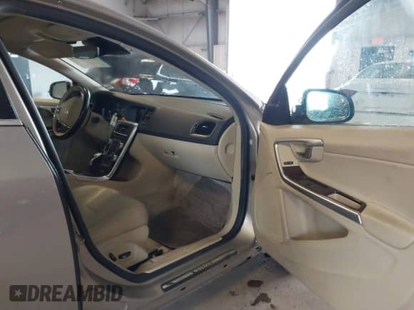 2015 Volvo S60 T5 Drive-E Premier with VIN YV126MFK7F1337818, listed as a IAAI auction lot 42680724 with 125,805 mi miles and . Bid and sale history available at DreamBid. Image 5.