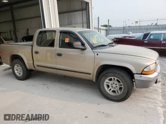 2004 Dodge Dakota SLT with VIN 1D7HL48N24S509606, listed as a Copart auction lot 70293515 with 201,566 mi miles and Clean title. Bid and sale history available at DreamBid. Image 4.