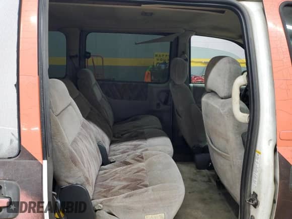1998 Chevrolet Venture Plus с VIN 1GNDU03E5WD272534, выставлен на аукционе Copart как лот 84756484 с пробегом 188 523 миль миль и Списание • Salvage title. История ставок и продаж доступна на DreamBid. Изображение 11.