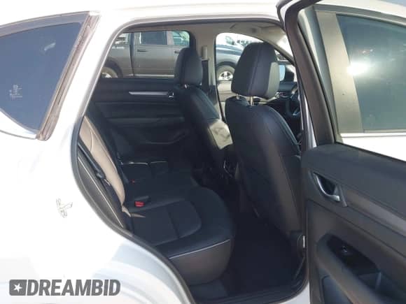 2024 Mazda CX-5 S Select z VIN JM3KFBBL9R0408107, wystawiony jako IAAI lot #43185801 z przebiegiem 9 809 mil mil oraz . Historia ofert i sprzedaży dostępna na DreamBid. Obrazek 8.