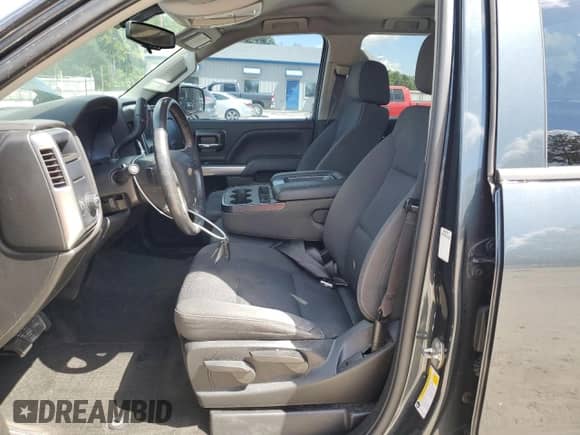 2018 Chevrolet Silverado 1500 LT with VIN 1GCRCREH8JZ160254, listed as a Copart auction lot 81596255 with 100,255 mi miles and Salvage title. Bid and sale history available at DreamBid. Image 7.