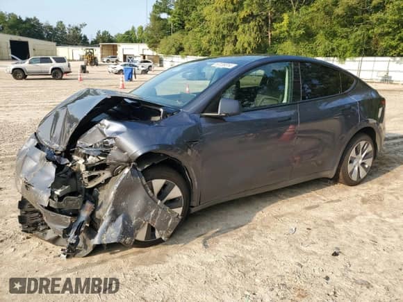 2023 Tesla Model Y Long Range with VIN 7SAYGAEE4PF668889, listed as a Copart auction lot 67239314 with 26,874 mi miles and Salvage title. Bid and sale history available at DreamBid. Image 1.