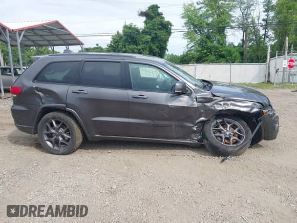 2021 Jeep Grand Cherokee 80th Anniversary z VIN 1C4RJFBG2MC612416, wystawiony jako IAAI lot #42457040 z przebiegiem 35 441 mil mil oraz . Historia ofert i sprzedaży dostępna na DreamBid. Obrazek 13.