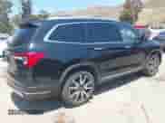 2022 Honda Pilot Touring 8-Passenger with VIN 5FNYF5H94NB004420, listed as a IAAI auction lot 42223140 with 43,210 mi miles and . Bid and sale history available at DreamBid. Image 4.