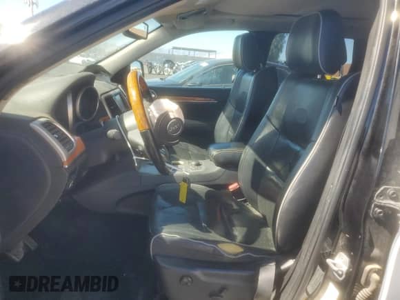 2012 Jeep Grand Cherokee Overland z VIN 1C4RJFCGXCC187959, wystawiony jako Copart lot #85349525 z przebiegiem 105 327 mil mil oraz Szkoda całkowita • Salvage title. Historia ofert i sprzedaży dostępna na DreamBid. Obrazek 7.