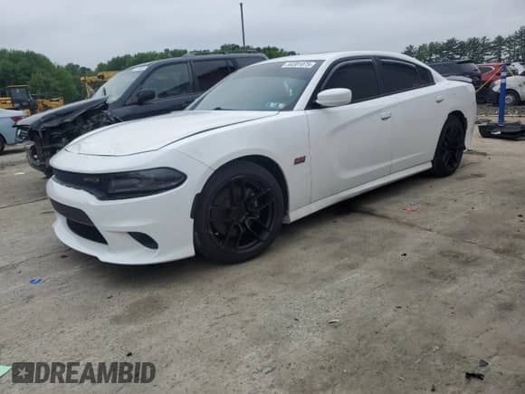 2019 Dodge Charger Scat Pack с VIN 2C3CDXGJ0KH734245, выставлен на аукционе Copart как лот 58381075 с пробегом Не указан миль и Списание • Salvage title. История ставок и продаж доступна на DreamBid. Изображение 1.