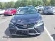 2021 Toyota Camry SE Nightshade z VIN 4T1G11AKXMU519763, wystawiony jako IAAI lot #43319480 z przebiegiem 97 862 mil mil oraz . Historia ofert i sprzedaży dostępna na DreamBid. Obrazek 13.