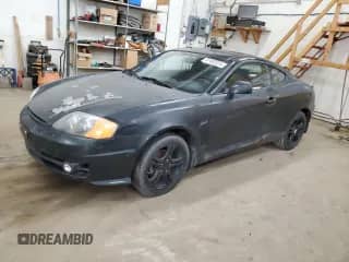 2003 Hyundai Tiburon with VIN KMHHM65D03U037970, listed as a Copart auction lot 51482024 with 178,210 mi miles and Non repairable. Bid and sale history available at DreamBid. Image 1.