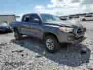 2017 Toyota Tacoma SR5 с VIN 5TFAZ5CN3HX036928, выставлен на аукционе Copart как лот 80676135 с пробегом 165 293 миль миль и Списание • Salvage title. История ставок и продаж доступна на DreamBid. Изображение 4.