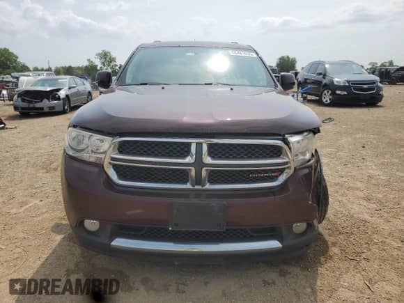 2012 Dodge Durango Crew with VIN 1C4RDHDG1CC335997, listed as a Copart auction lot 68481635 with 139,337 mi miles and Salvage title. Bid and sale history available at DreamBid. Image 5.
