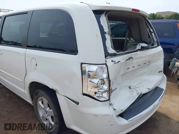 2012 Dodge Grand Caravan SXT with VIN 2C4RDGCG9CR275700, listed as a IAAI auction lot 43158372 with 168,109 mi miles and . Bid and sale history available at DreamBid. Image 6.