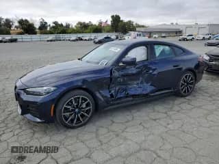 2023 BMW i4 eDrive40 with VIN WBY73AW04PFP33371, listed as a Copart auction lot 66019665 with 11,327 mi miles and Salvage title. Bid and sale history available at DreamBid. Image 1.