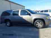 2011 Chevrolet Suburban LT z VIN 1GNSCJE09BR344091, wystawiony jako IAAI lot #41605909 z przebiegiem 312 559 mil mil oraz . Historia ofert i sprzedaży dostępna na DreamBid. Obrazek 13.