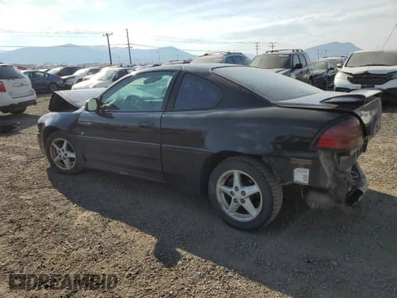 2001 Pontiac Grand Am GT z VIN 1G2NW12E31M584119, wystawiony jako Copart lot #76099984 z przebiegiem 293 559 mil mil oraz Czysty tytuł • Clean title. Historia ofert i sprzedaży dostępna na DreamBid. Obrazek 2.