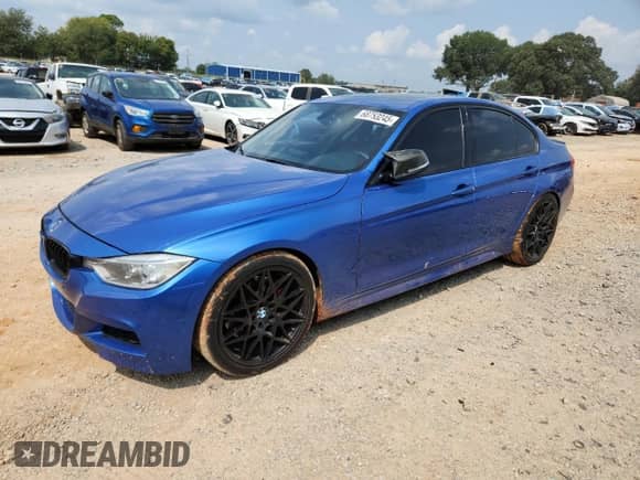 2014 BMW 3 Series 335i xDrive with VIN WBA3B9G57ENR90410, listed as a Copart auction lot 68753245 with 143,423 mi miles and Salvage title. Bid and sale history available at DreamBid. Image 1.