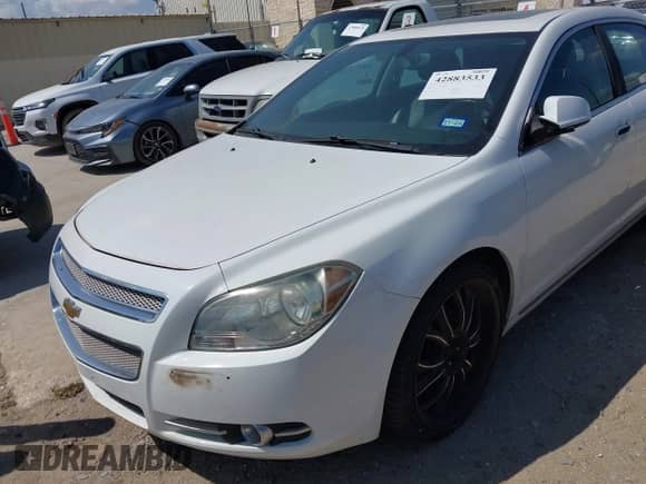 2012 Chevrolet Malibu LTZ z VIN 1G1ZG5E74CF135059, wystawiony jako IAAI lot #42883533 z przebiegiem 198 051 mil mil oraz . Historia ofert i sprzedaży dostępna na DreamBid. Obrazek 6.