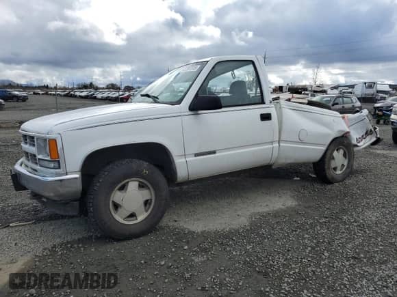 1997 GMC Sierra 1500 with VIN 1GTEK14W5VZ551810, listed as a Copart auction lot 47287015 with 168,113 mi miles and Salvage title. Bid and sale history available at DreamBid. Image 1.