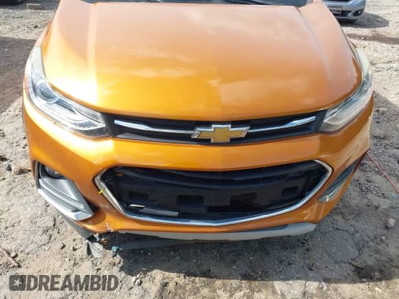 2017 Chevrolet Trax Premier with VIN 3GNCJMSB0HL139678, listed as a IAAI auction lot 42693196 with 90,024 mi miles and . Bid and sale history available at DreamBid. Image 6.