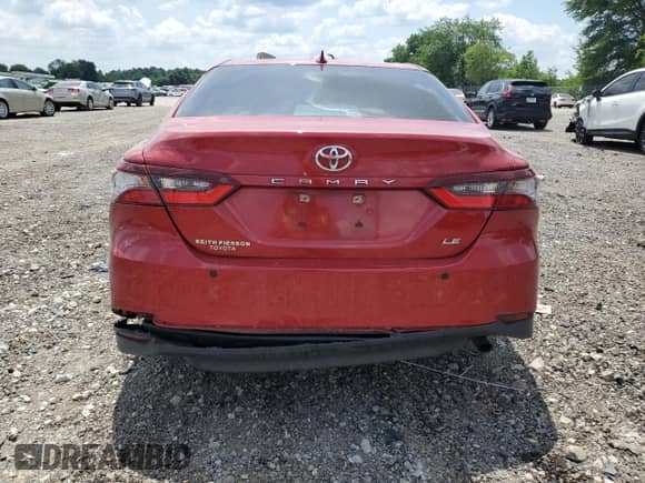 2023 Toyota Camry LE z VIN 4T1C11AK9PU172798, wystawiony jako Copart lot #64280385 z przebiegiem 69 738 mil mil oraz Nie do naprawy • Non repairable. Historia ofert i sprzedaży dostępna na DreamBid. Obrazek 6.