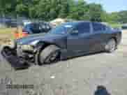 2013 Dodge Charger SXT Plus z VIN 2C3CDXHG0DH667541, wystawiony jako Copart lot #65617635 z przebiegiem 173 596 mil mil oraz Szkoda całkowita • Salvage title. Historia ofert i sprzedaży dostępna na DreamBid. Obrazek 1.