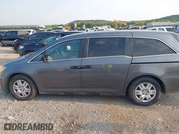 2012 Honda Odyssey LX z VIN 5FNRL5H2XCB065719, wystawiony jako IAAI lot #43173490 z przebiegiem 242 271 mil mil oraz . Historia ofert i sprzedaży dostępna na DreamBid. Obrazek 15.