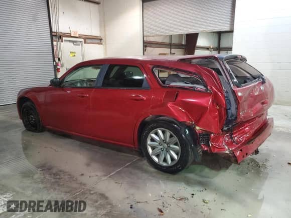 2007 Dodge Magnum with VIN 2D4FV47T47H701989, listed as a Copart auction lot 71868053 with 117,909 mi miles and Salvage title. Bid and sale history available at DreamBid. Image 2.