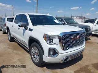 2019 GMC Sierra 1500 Denali z VIN 1GTP8FED0KZ164501, wystawiony jako IAAI lot #43003374 z przebiegiem 102 995 mil mil oraz . Historia ofert i sprzedaży dostępna na DreamBid. Obrazek 1.